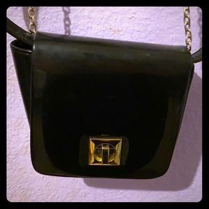 Black hand and over the shoulder bag